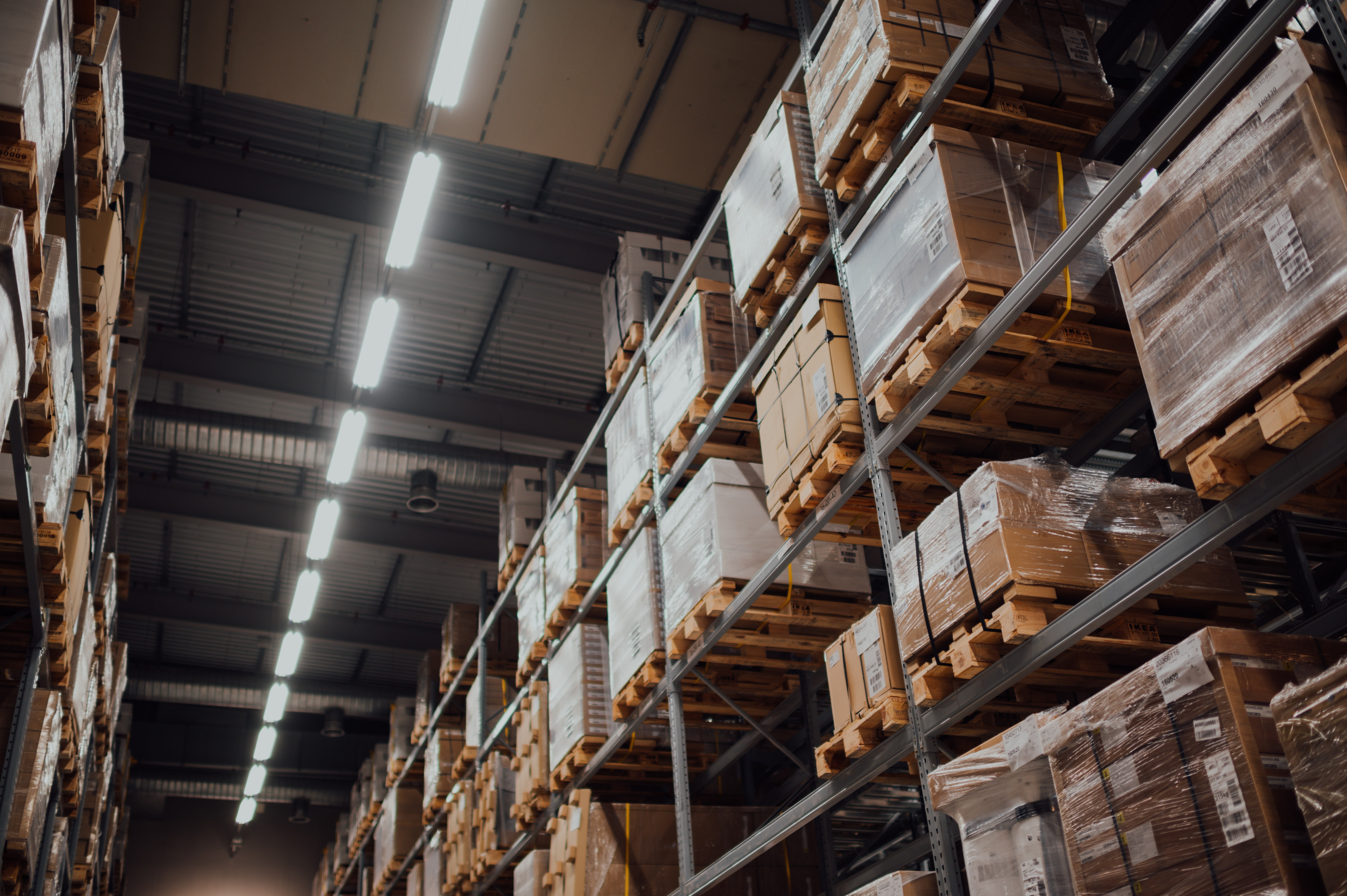 Products stored on palettes in a fulfillment center